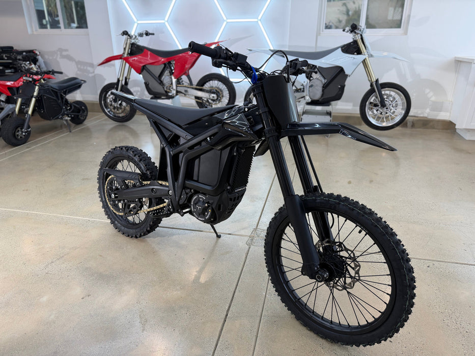 Talaria Komodo 2026 front three-quarter real photo showing inverted fork and knobby tyres