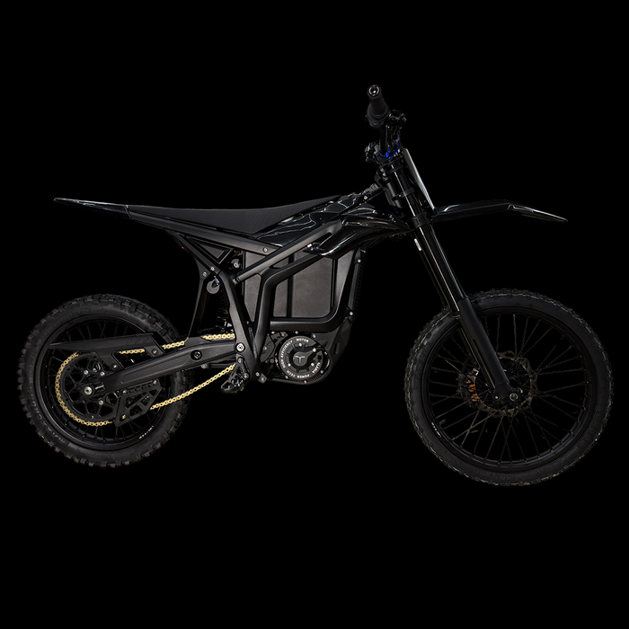 Talaria Komodo 2026 studio side profile in black showing full-size dirt bike chassis